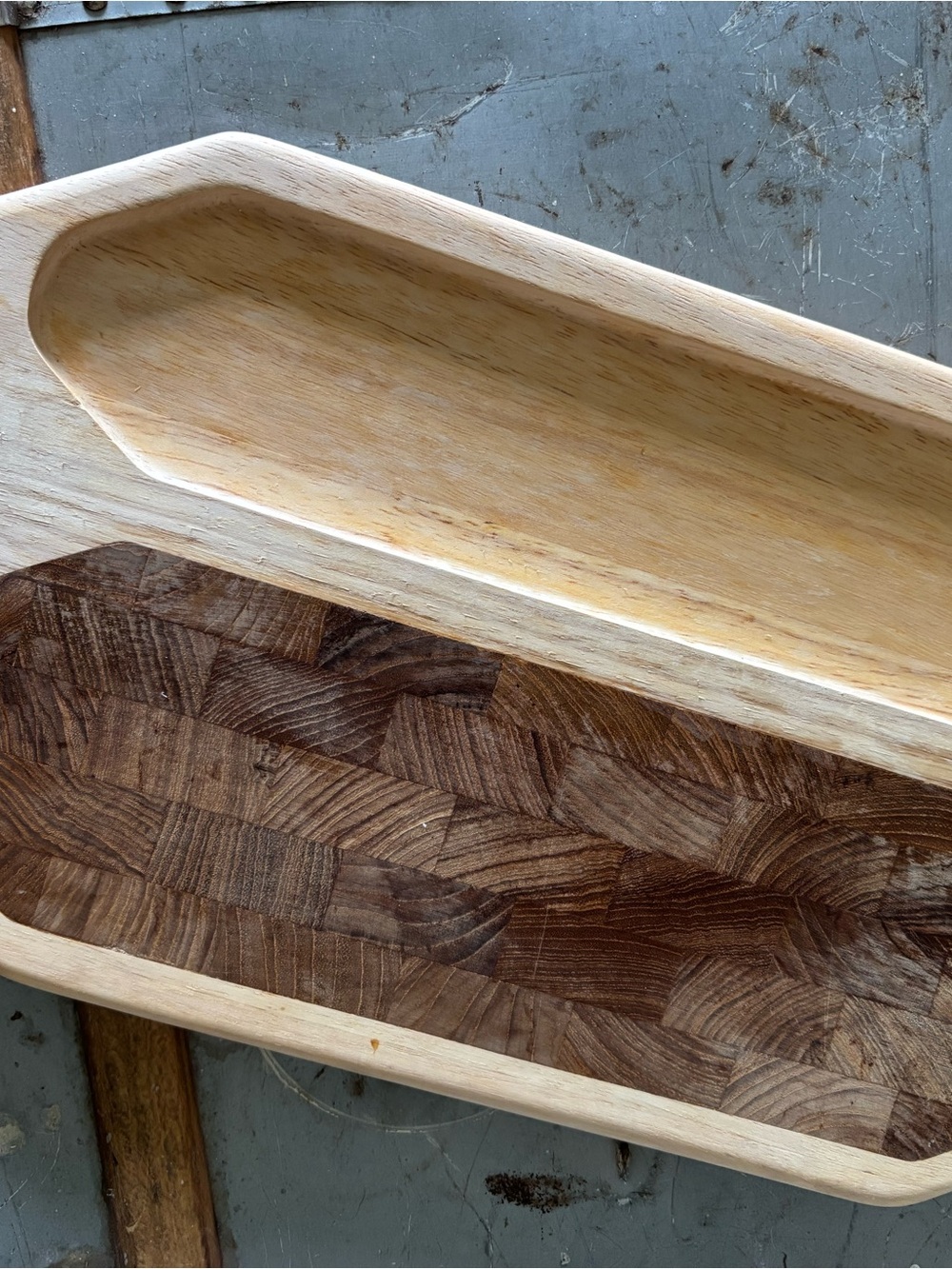 Two-tone wood cutting/serving board.